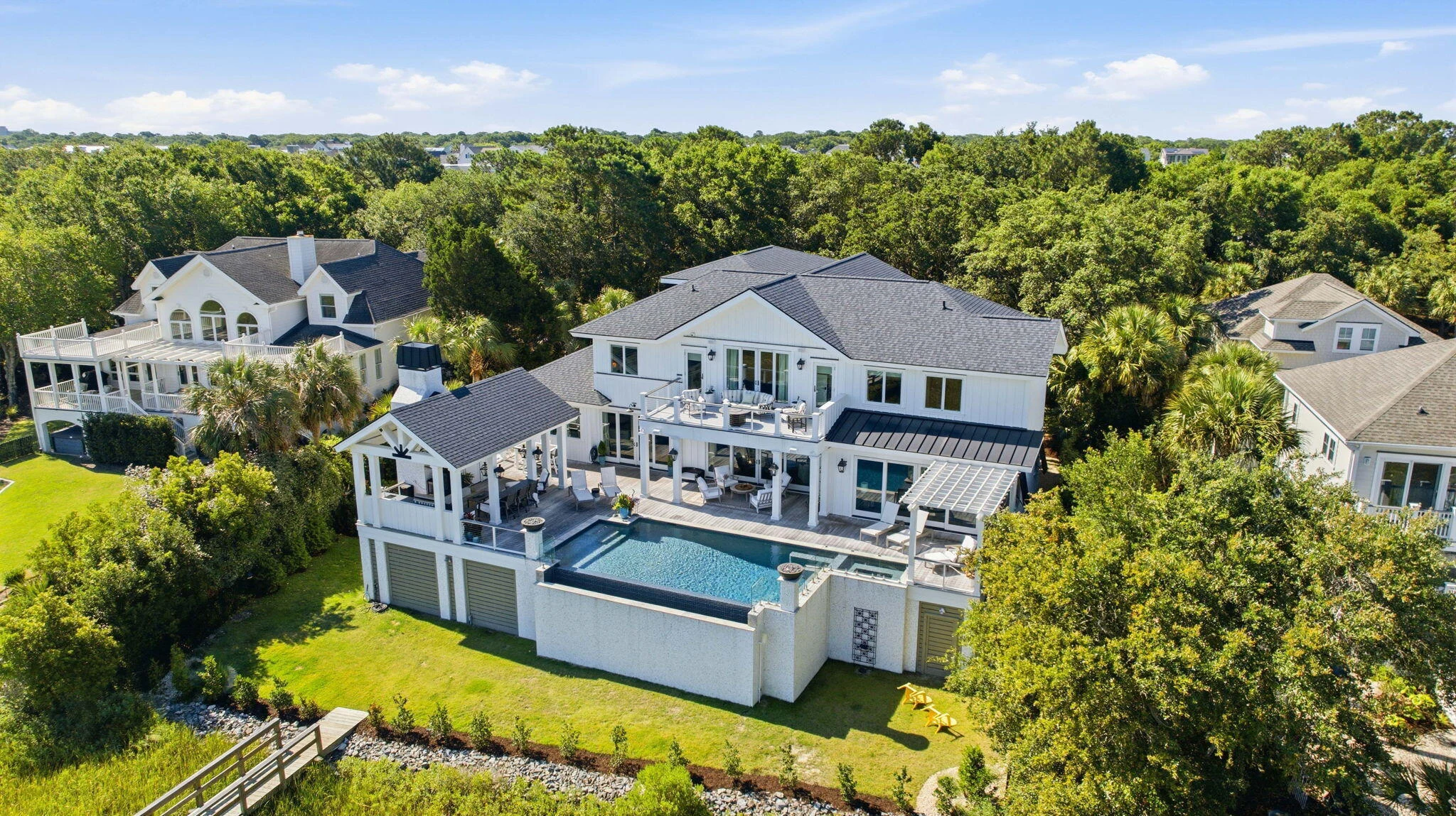 Aerial view of the residence and waterfront terrace
